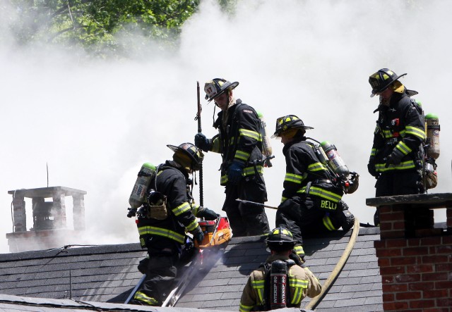 Firefighters operate on the roof @ 77 Chestnut Ridge rd Photo courtesy Frank Becerra